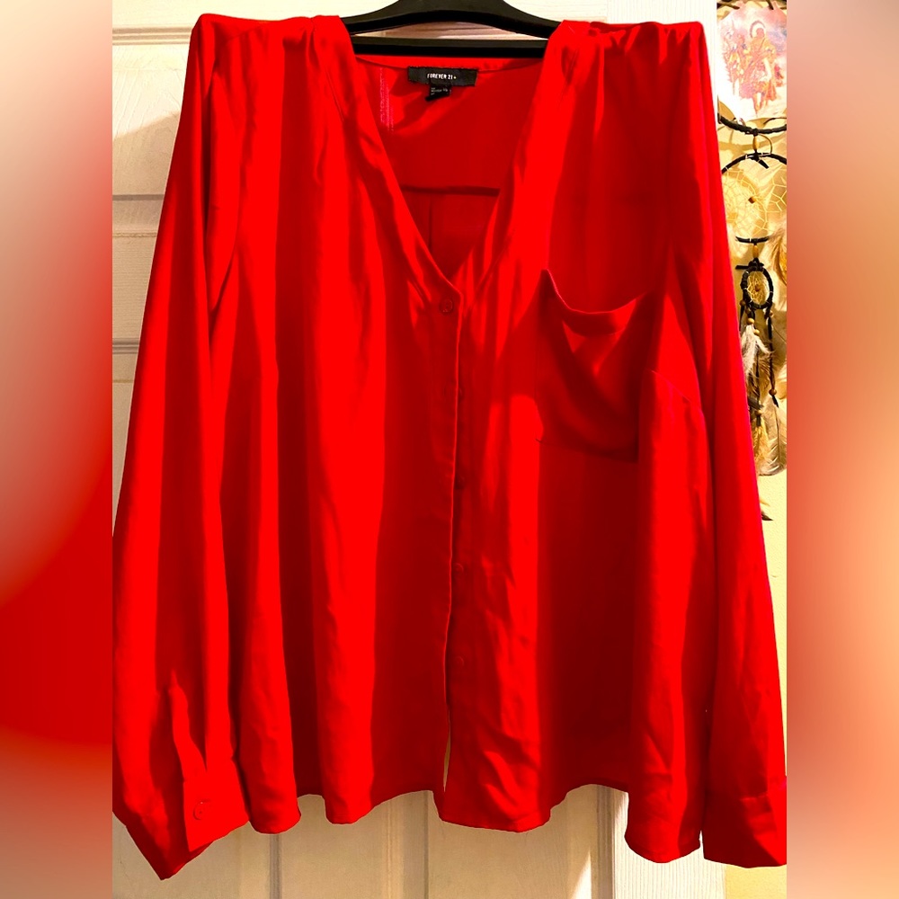 Bright beautiful Red button down blouse with small slits. Worn once